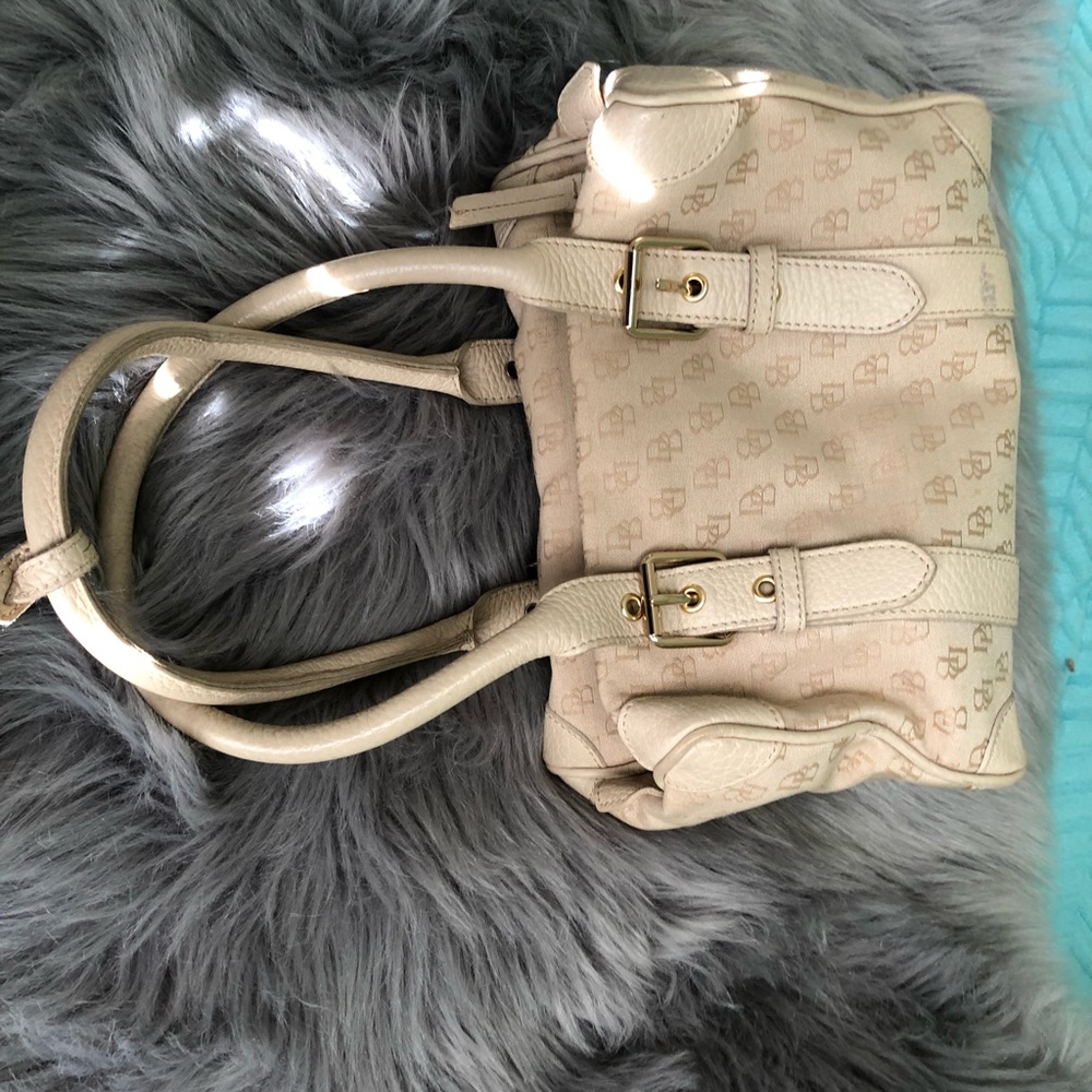 Tan Dooney & Bourke